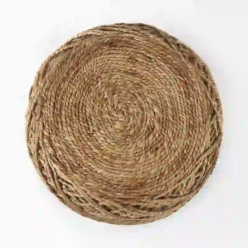 Pouf rond Mercana Allium en laine tissée marron