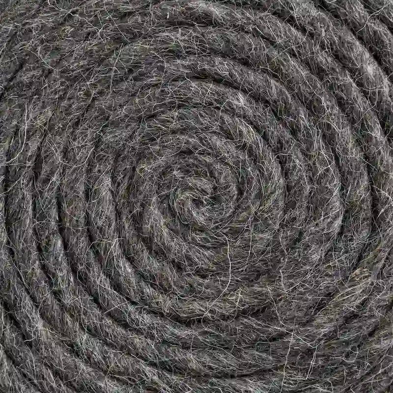 Pouf rond Mercana Allium en laine tissée marron