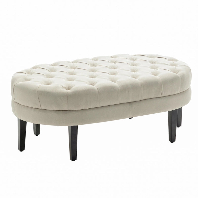 Pouf de cocktail ovale en tissu Itan de Porthos Home avec pieds en bois d'hévéa