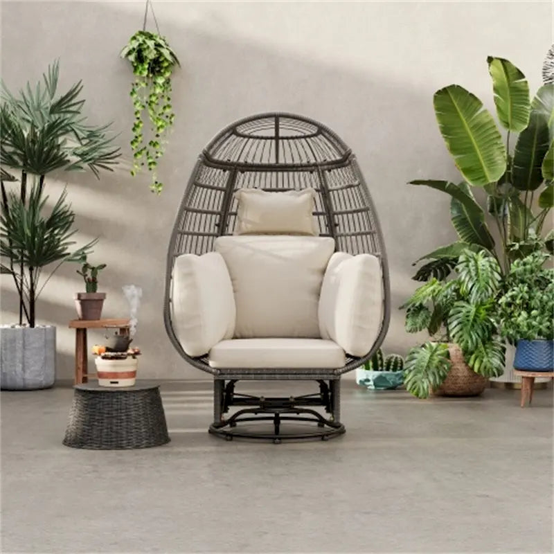 Fauteuil pivotant de jardin en rotin en forme d'œuf avec coussins et fonction à bascule