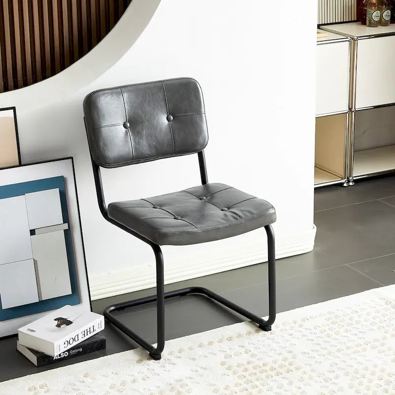 Chaise de salle à manger moderne simple en cuir avec tube métallique